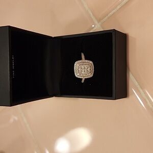 size 8 10kt Diamond cluster ring.